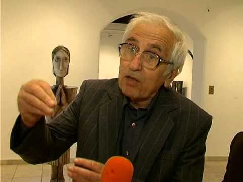 The sculptor Alyosha Kafedjiiski giving an interview during the opening of one of his exhibitions.